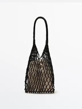Leather mesh bag with linen pouch